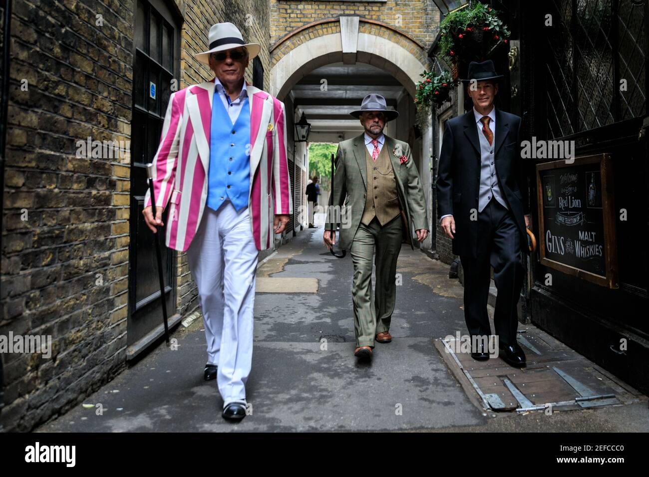 Dapper British Chaps and Chapettes at ' The Grand Flaneur' Chap Walk,  Mayfair, London, UK Stock Photo - Alamy
