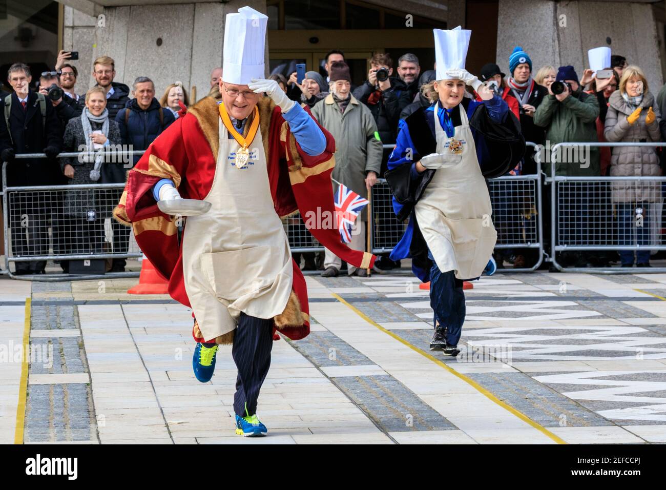 Participants from the City of London Worshipful Companies at the annual Shrove Tuesday Inter-Livery pancake races, London, UK Stock Photo