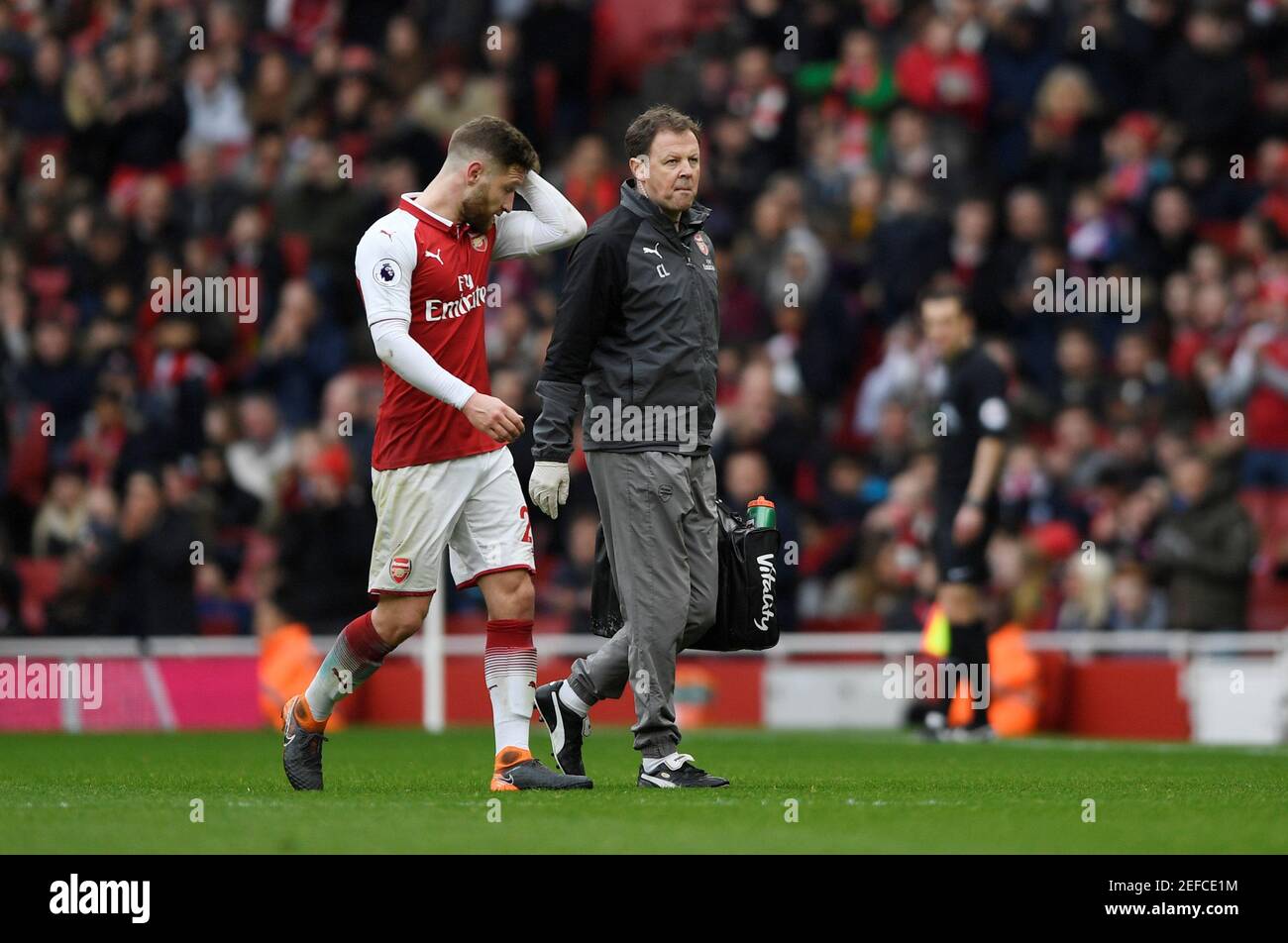 Soccer Football - Premier League - Arsenal vs Watford - Emirates Stadium, London, Britain - March 11, 2018   Arsenal's Shkodran Mustafi comes off injured             Action Images via Reuters/Tony O'Brien    EDITORIAL USE ONLY. No use with unauthorized audio, video, data, fixture lists, club/league logos or 'live' services. Online in-match use limited to 75 images, no video emulation. No use in betting, games or single club/league/player publications.  Please contact your account representative for further details. Stock Photo