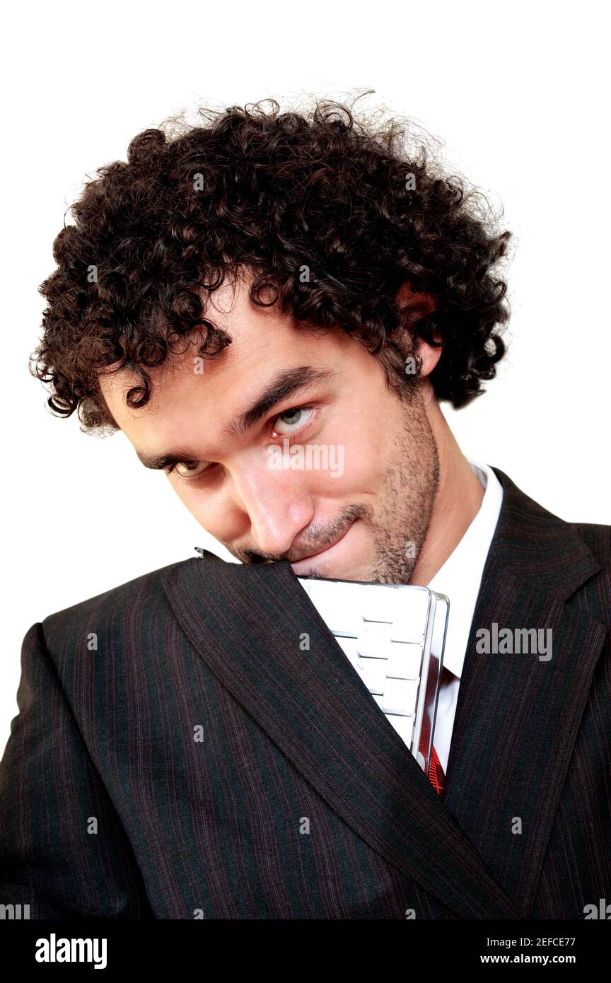 Businessman with a keyboard hidden in his suit stock photo alamy