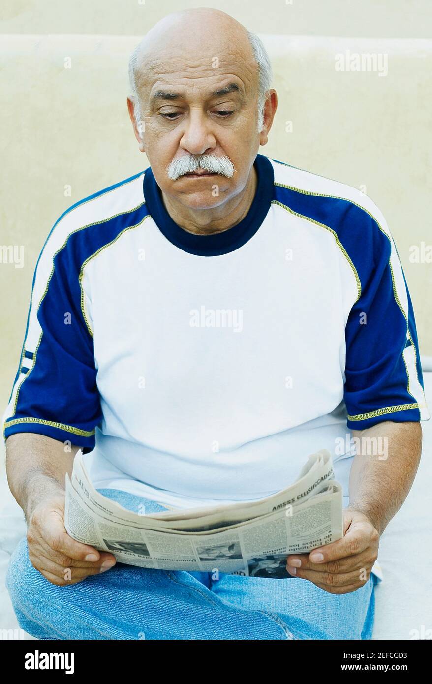 Balding man reading hi-res stock photography and images - Alamy
