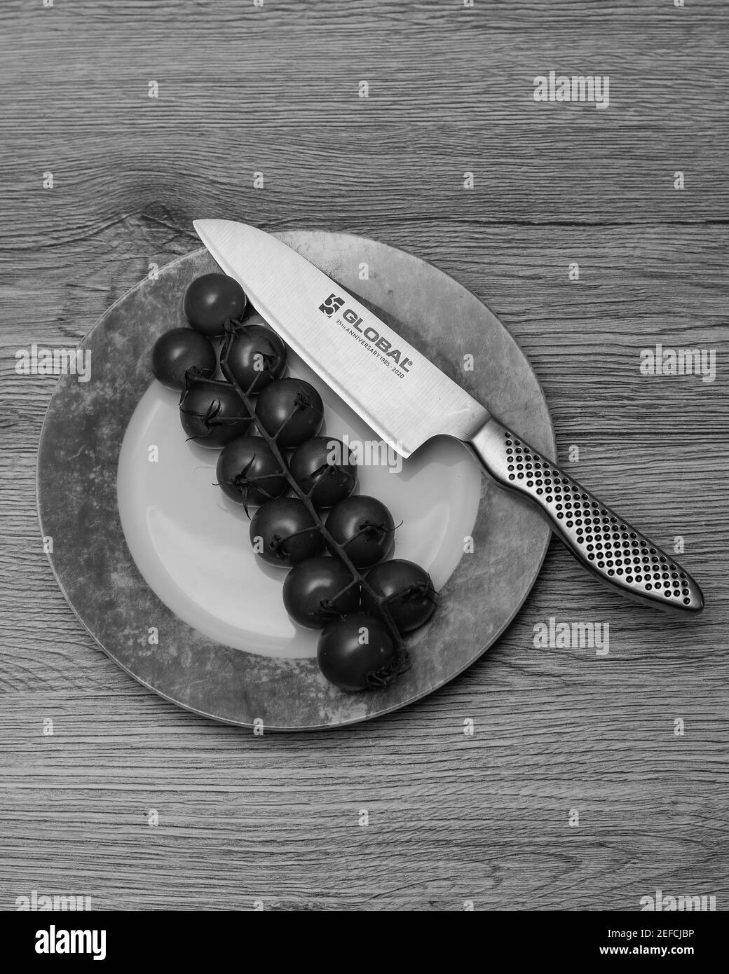 Fresh cherry tomatoes diced for bruschetta Stock Photo