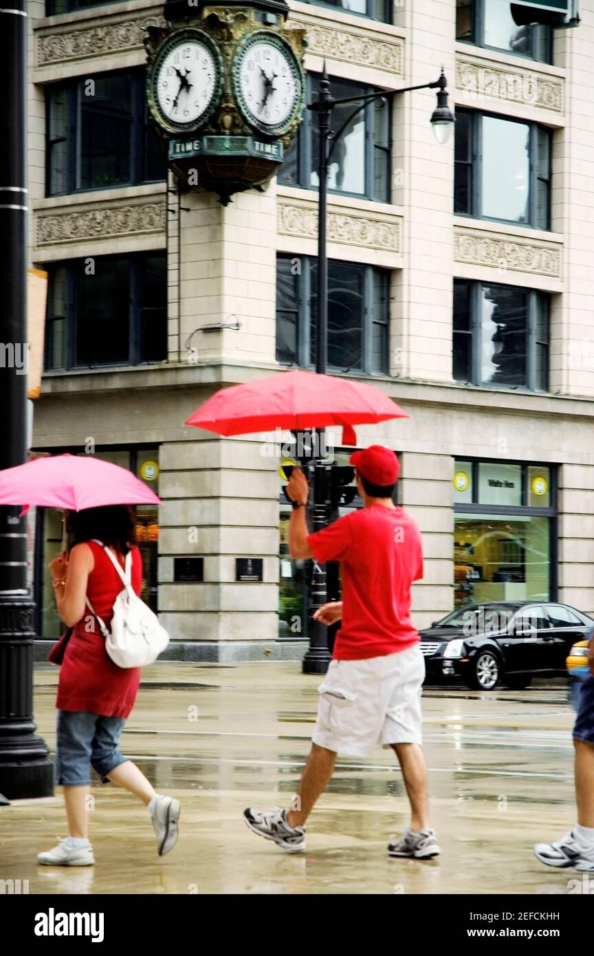 Side view man walking umbrella hi-res stock photography and images - Alamy