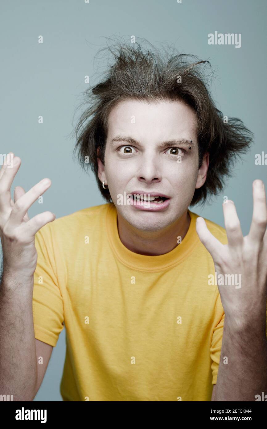 Portrait of a young man screaming Stock Photo - Alamy