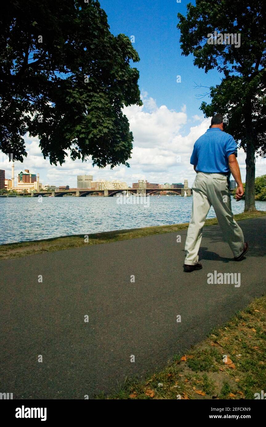 Rear view of a person walking Stock Photo