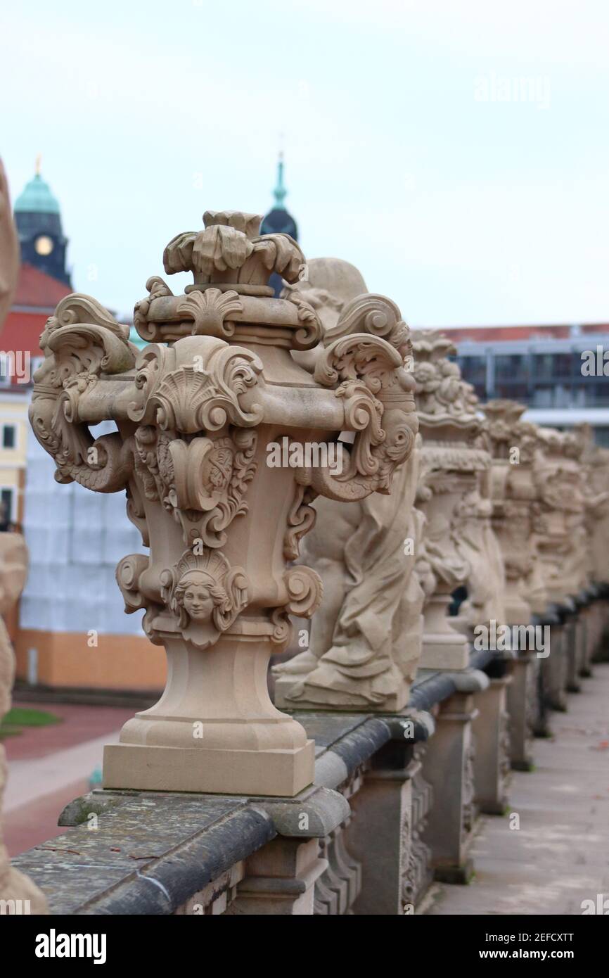 Statue of decorative vase on wall Stock Photo