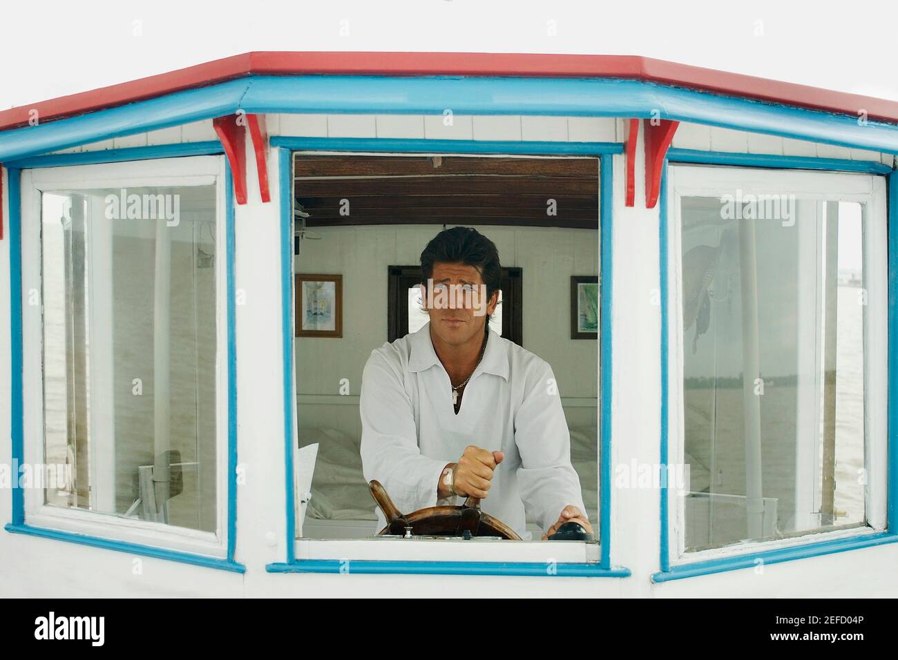 Man driving a motorboat hi-res stock photography and images - Alamy