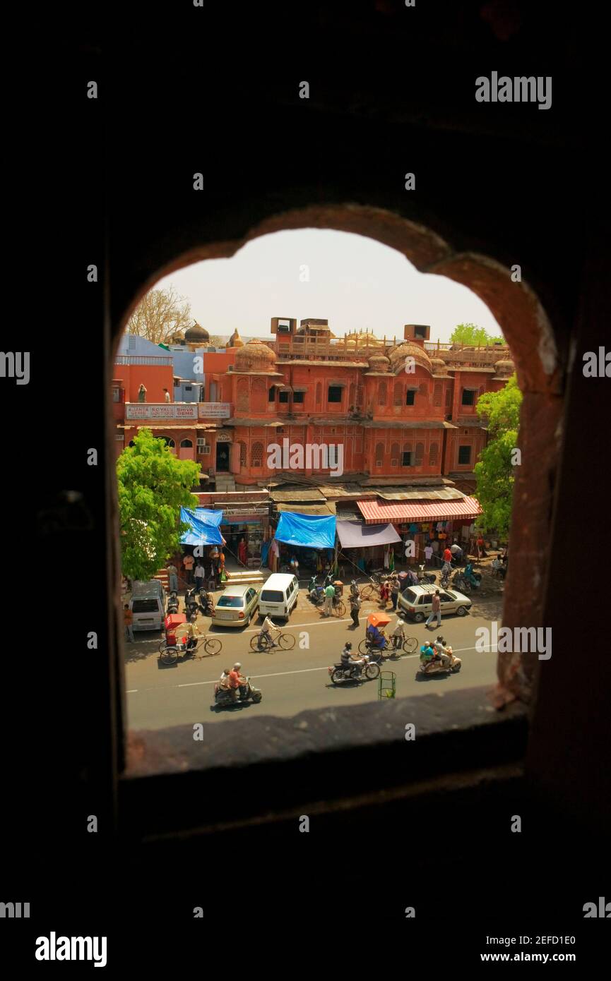 High angle view of the street seen from a arched window, City Palace ...