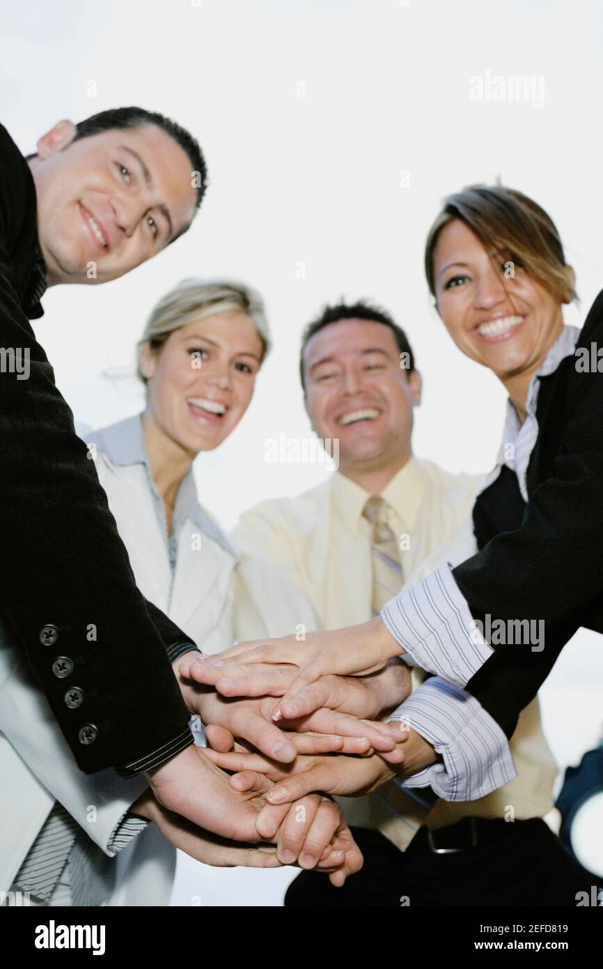 Team work three human hands hi-res stock photography and images - Alamy