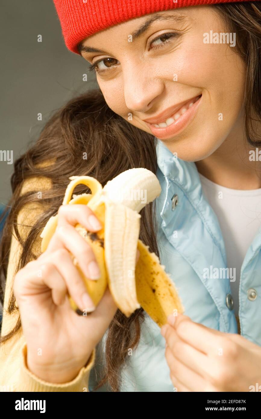 Woman peeling banana hi-res stock photography and images - Alamy
