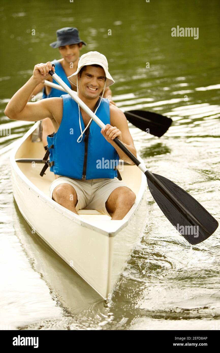 High angle view of two mid adult men boating in a river Stock Photo