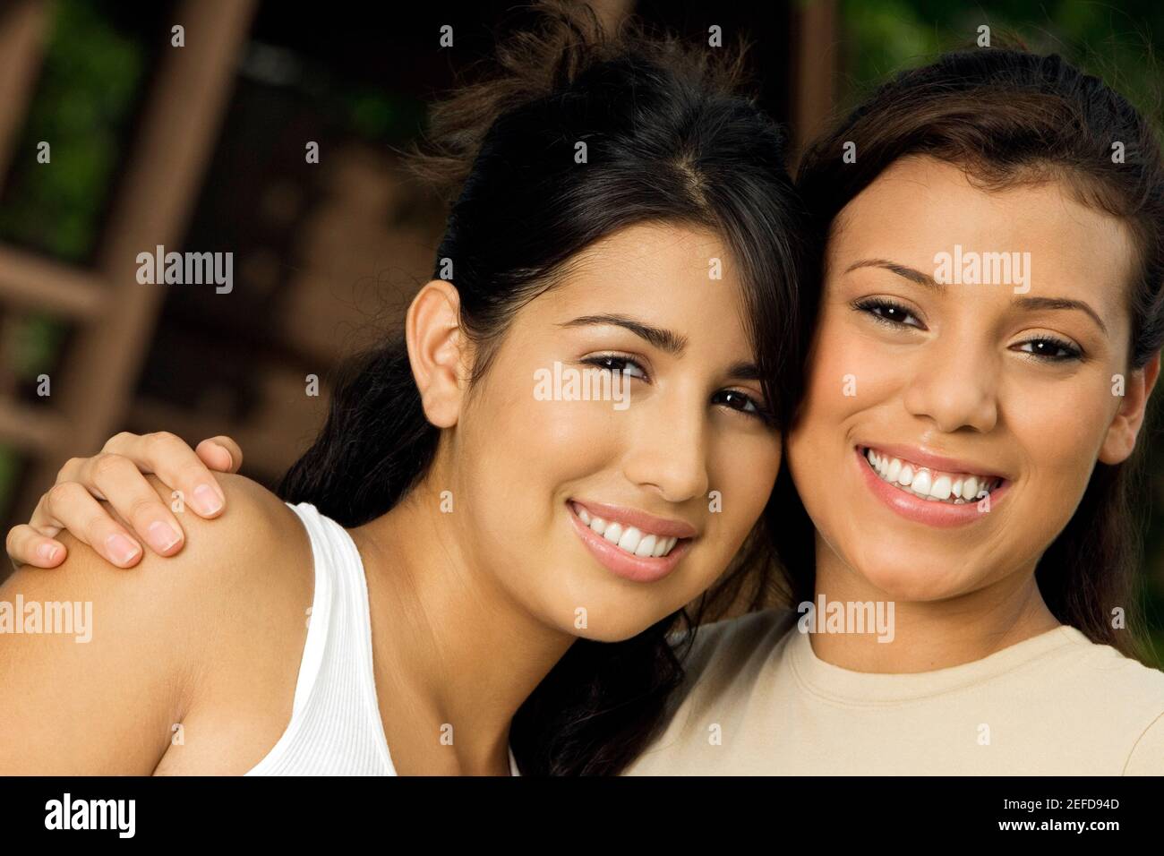 Portrait of two teenage girls smiling Stock Photo