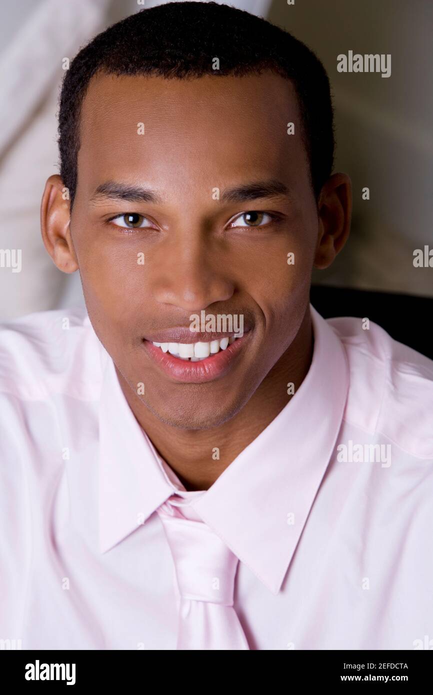 Portrait of a businessman smiling Stock Photo - Alamy