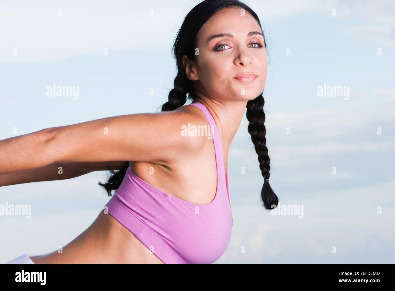 Portrait of a young woman exercising Stock Photo