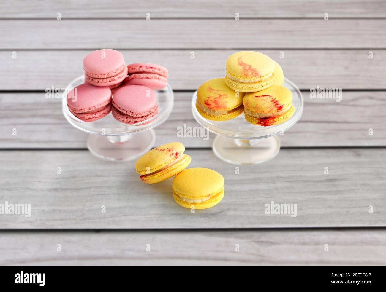 macaroons on glass confectionery stand Stock Photo