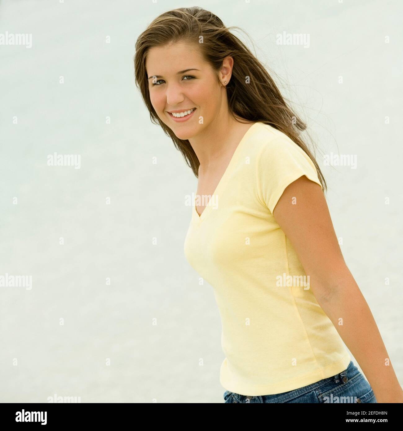 Portrait of a teenage girl smiling Stock Photo - Alamy