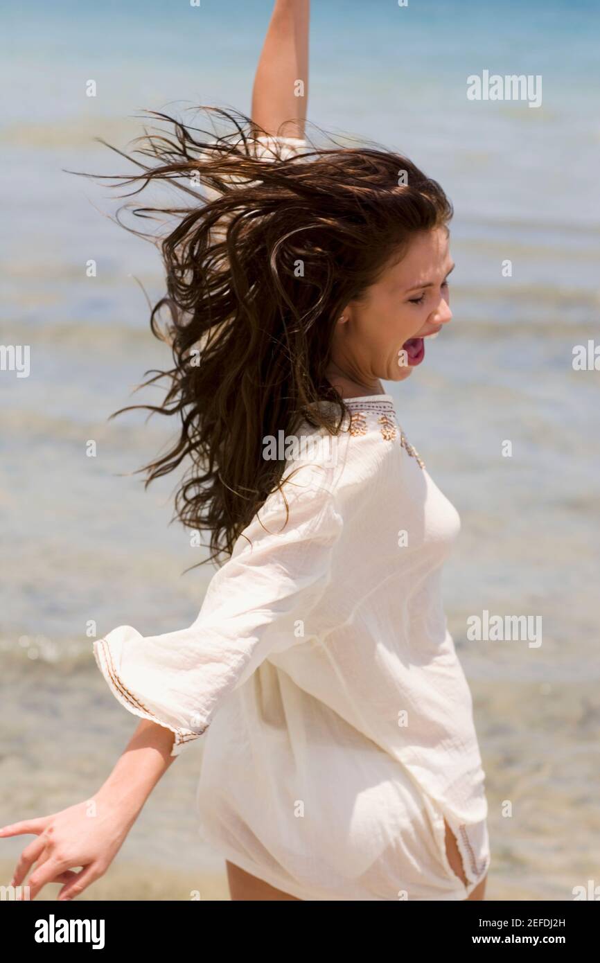 Beach Rode Side Profile Side profile of a young woman on the beach Stock Photo - Alamy