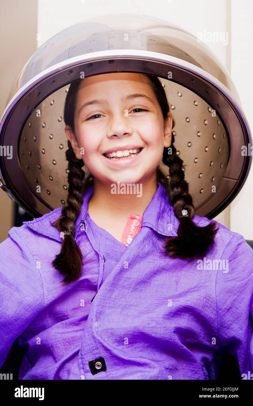 Girl Sitting Under Hair Dryer High Resolution Stock Photography and