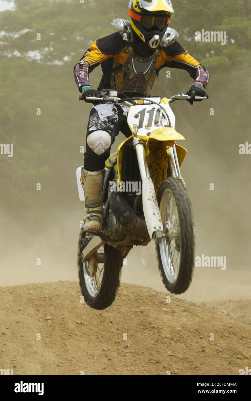 Motocross rider performing a jump on a motorcycle Stock Photo Alamy