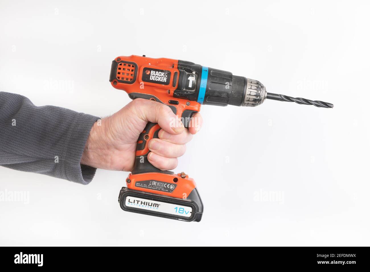 A man holding a Black and Decker cordless 18v drill Stock Photo - Alamy