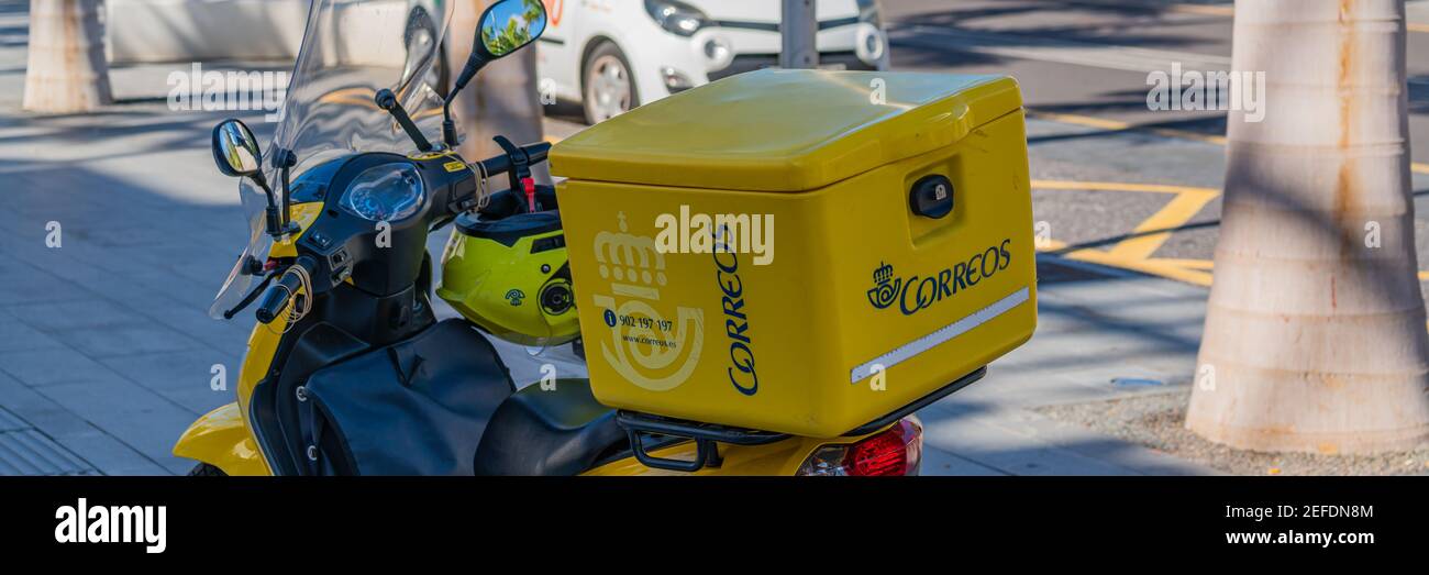 TENERIFE, SPAIN - DECEMBER 2020: Scooters of the postal service correos, Panorama view Stock Photo
