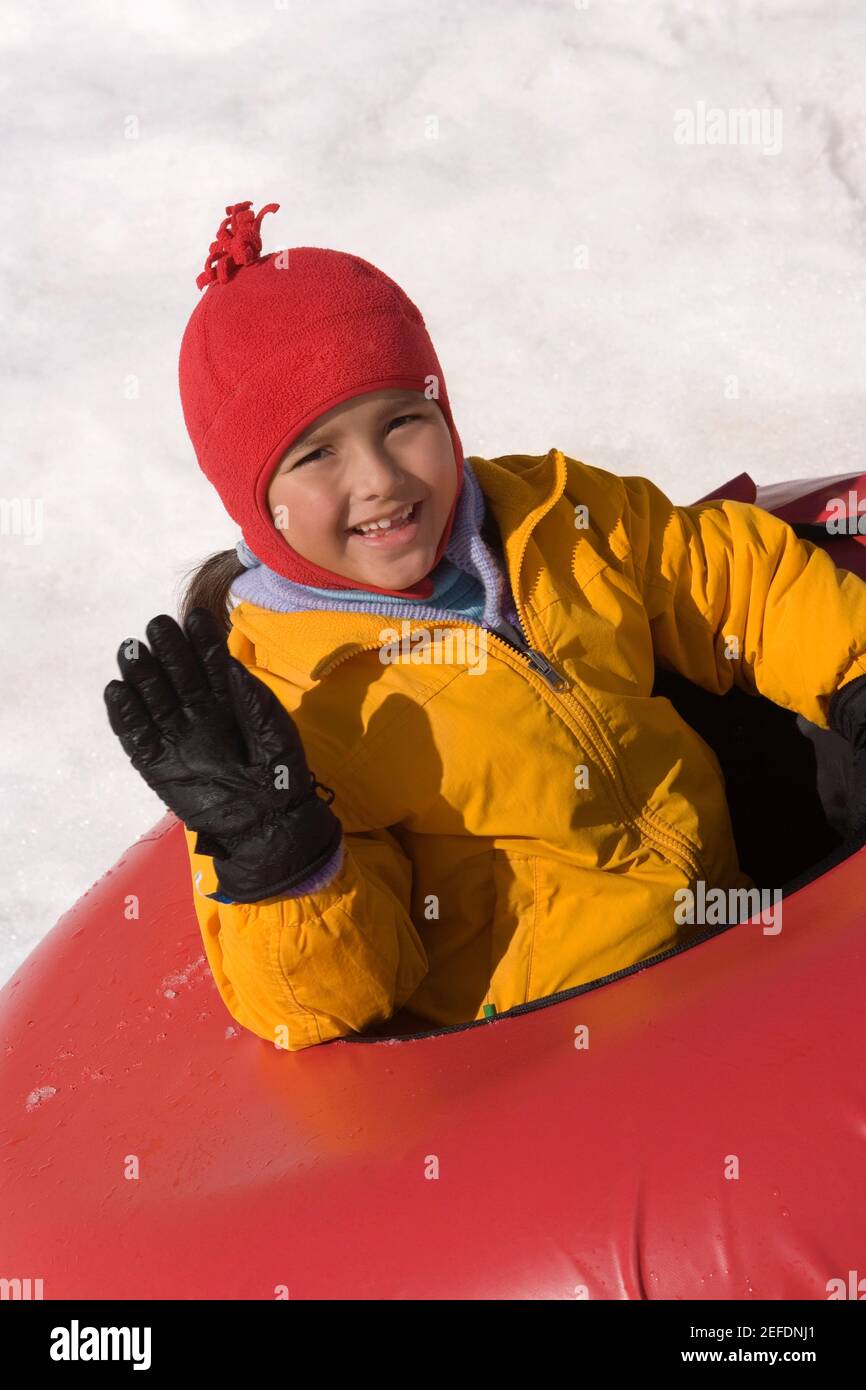 Portrait of a girl sitting on an inner tube Stock Photo Alamy