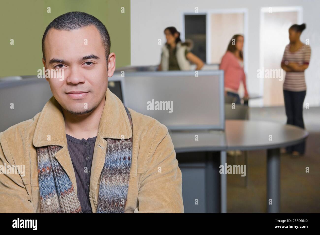 Portrait of a young man in a computer lab Stock Photo - Alamy