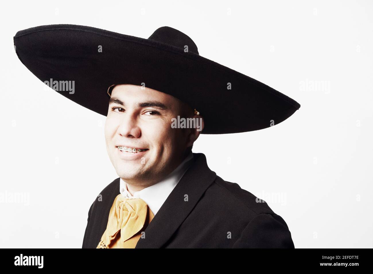 Portrait of a young man in traditional clothing Stock Photo - Alamy
