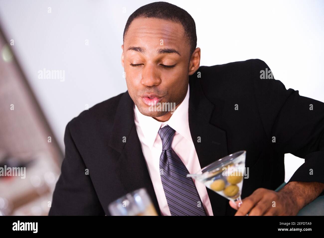 Closeup of a businessman puckering his lips Stock Photo Alamy
