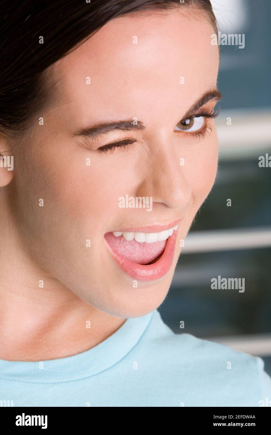 Woman with one eye closed one eye open hi-res stock photography and ...