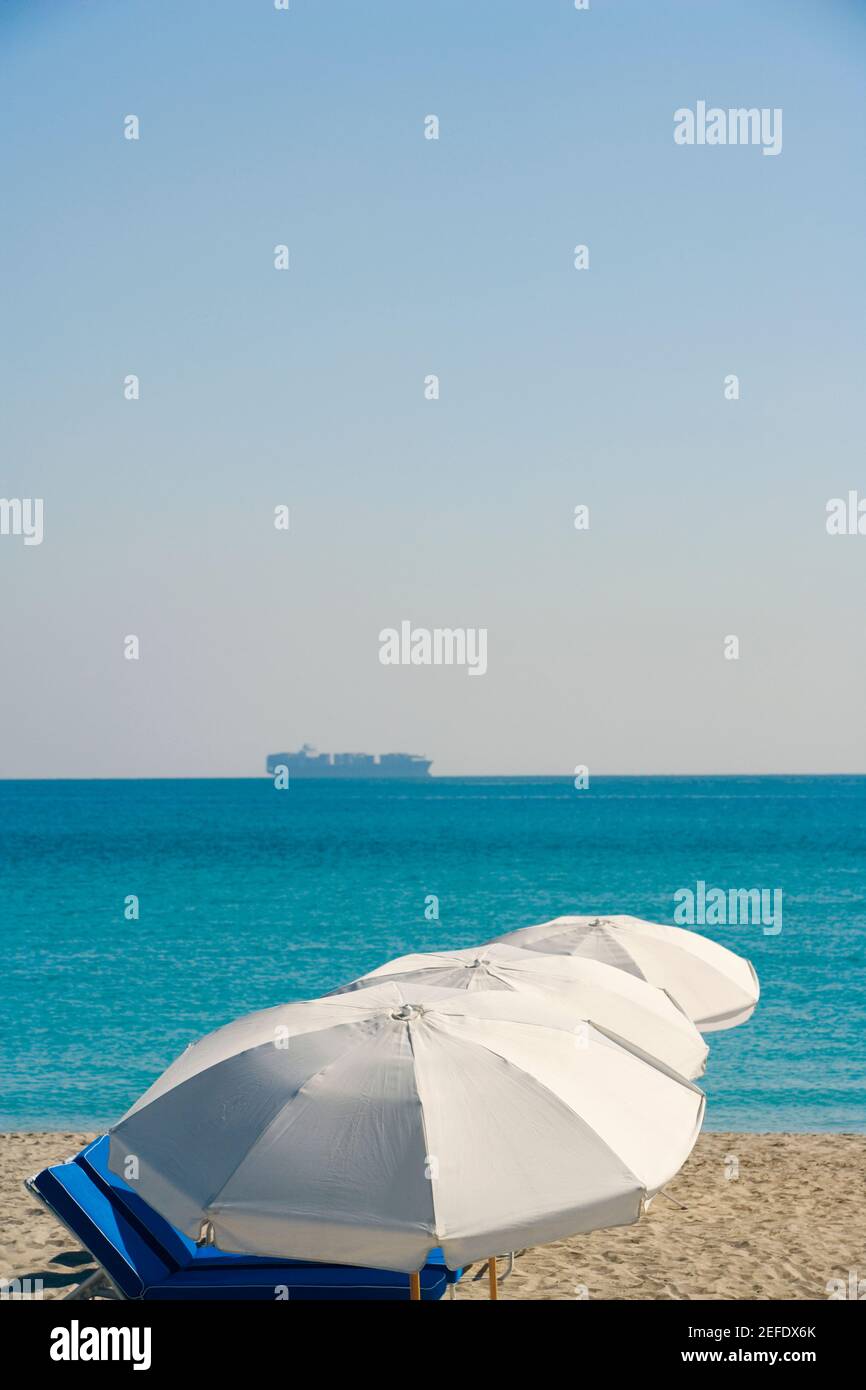 High angle view of beach umbrellas on the beach Stock Photo