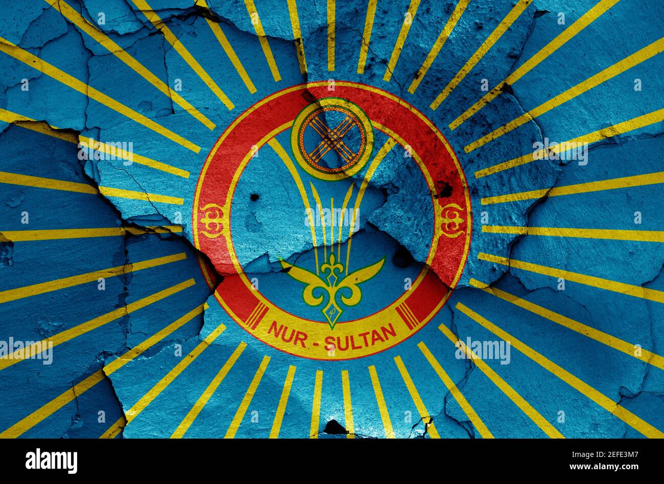 flag of Nur-Sultan painted on cracked wall Stock Photo