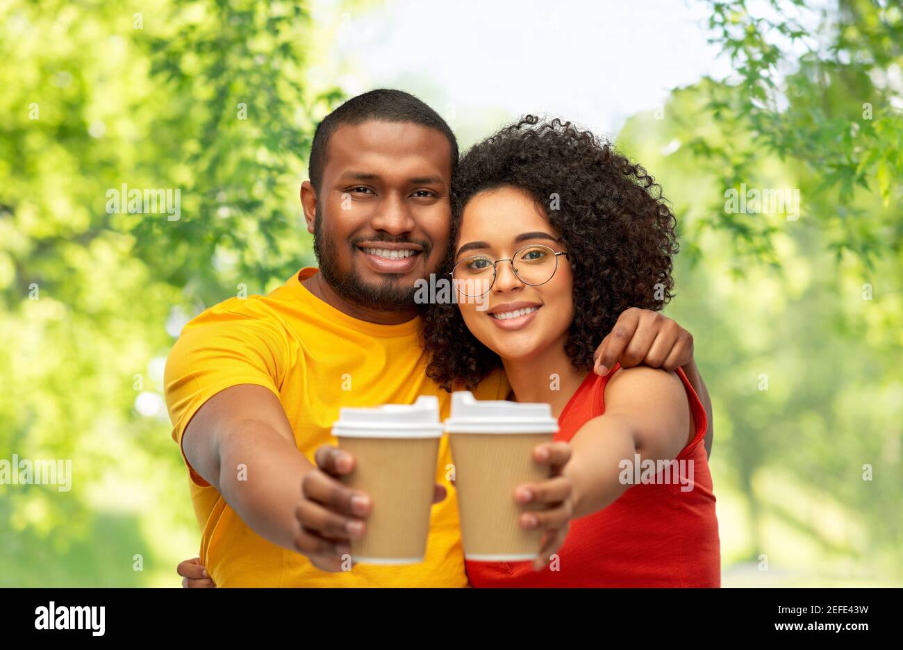happy african american couple with coffee cups Stock Photo - Alamy