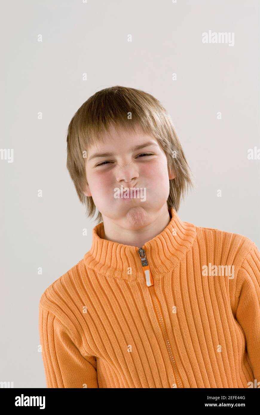 Close up of a boy making a face Stock Photo