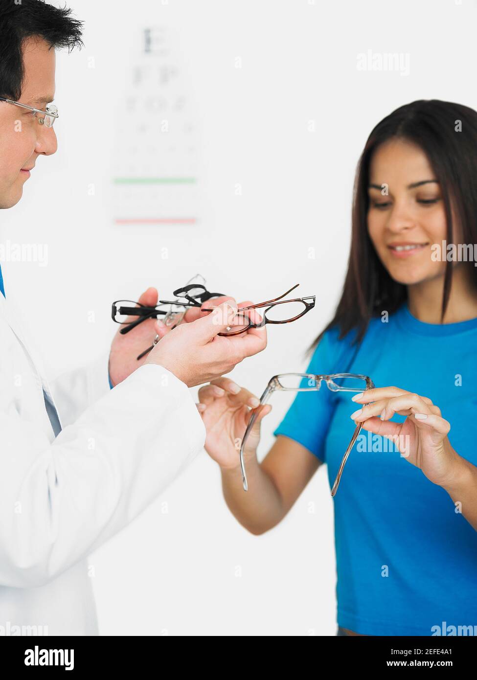 Female patient choosing eyeglasses Stock Photo
