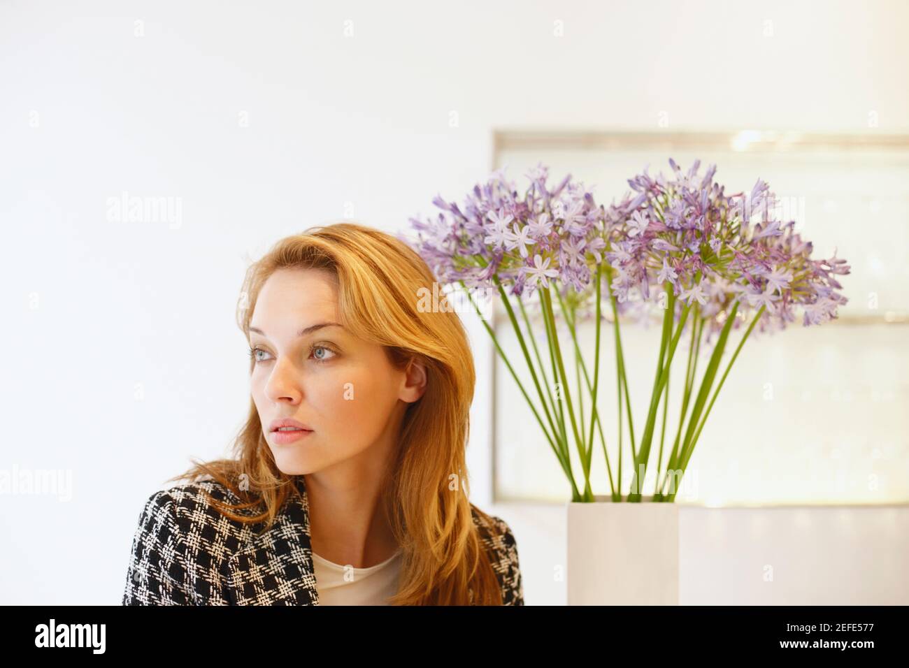 Young woman looking away Stock Photo Alamy