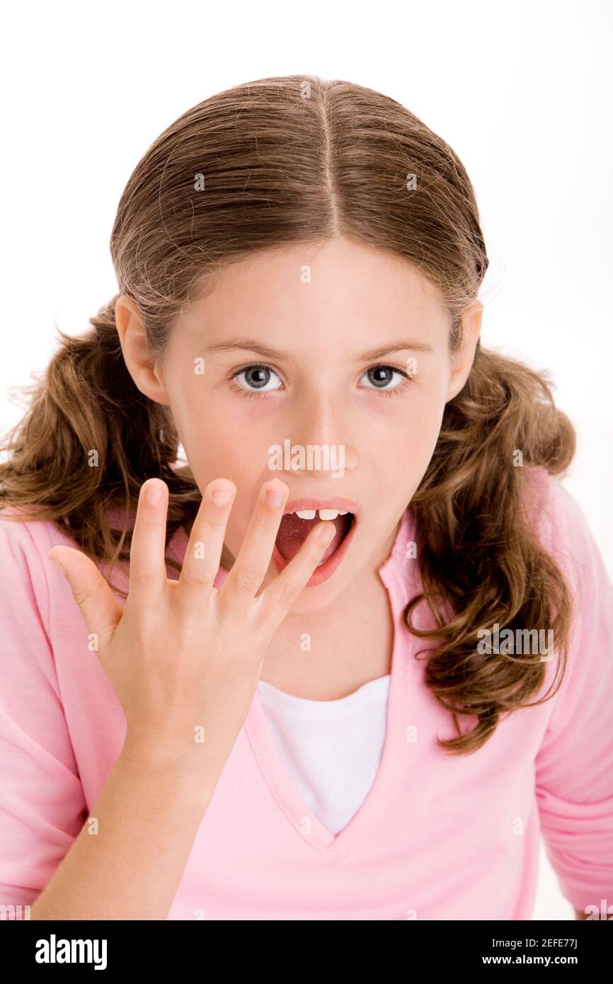 Portrait of a girl with her finger in her mouth Stock Photo