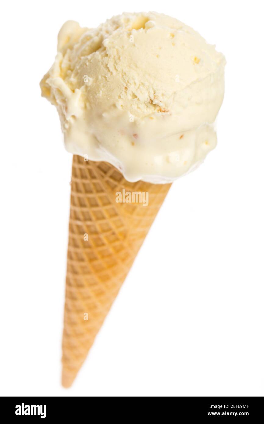 An ice cream cone with a scoop of ice cream Stock Photo