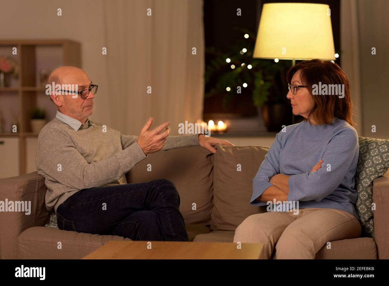 unhappy senior couple arguing at home Stock Photo