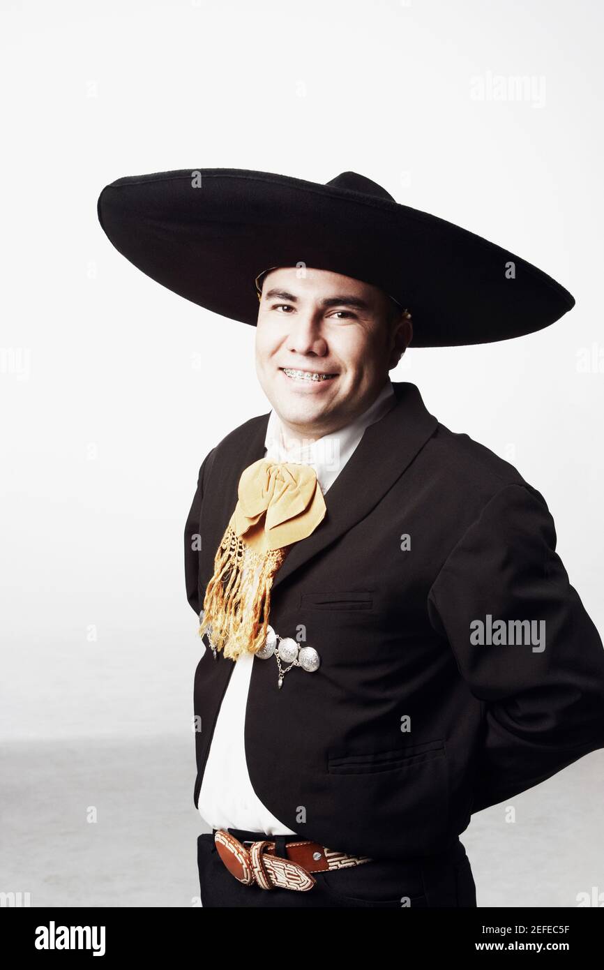 Portrait of a young man in traditional clothing Stock Photo - Alamy