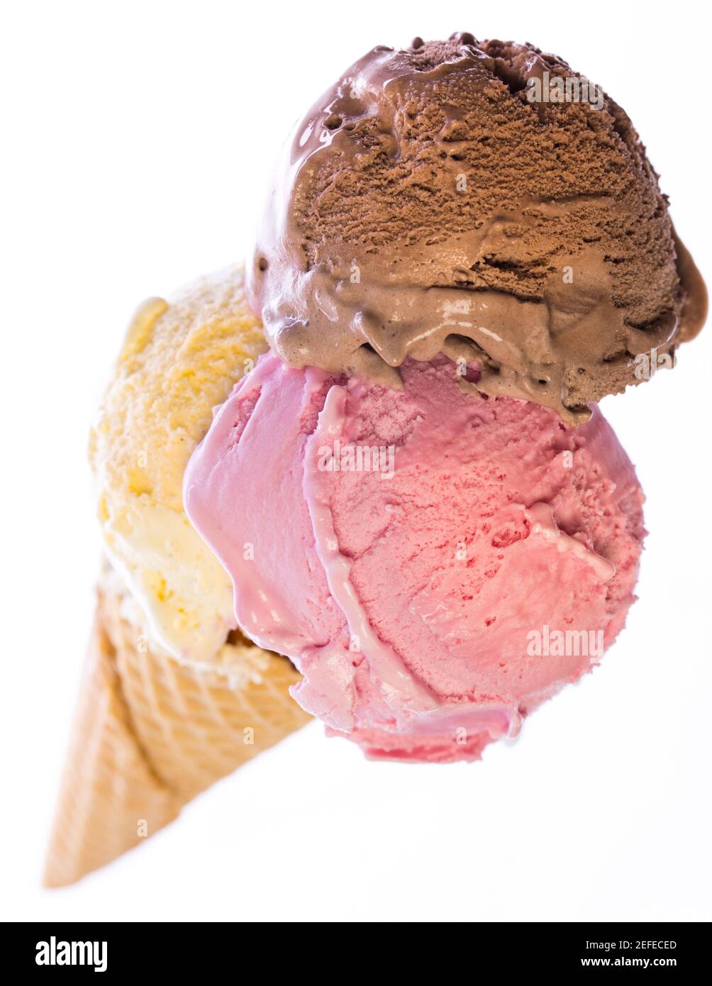 top view of real edible ice cream cone with 3 different scoops of ice