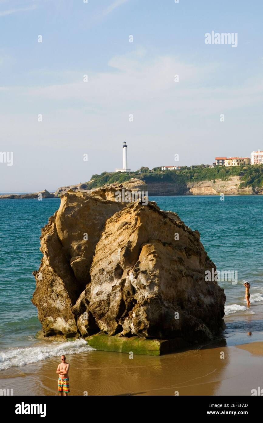 Rock on the beach, Grande Plage, Phare de Biarritz, Biarritz, France Stock Photo