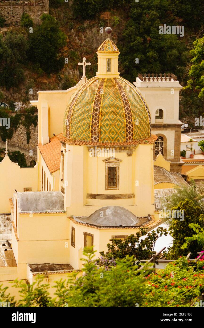 High angle view of a church in a town, Chiesa di Santa Maria Assunta, Positano, Amalfi Coast, Salerno, Campania, Italy Stock Photo