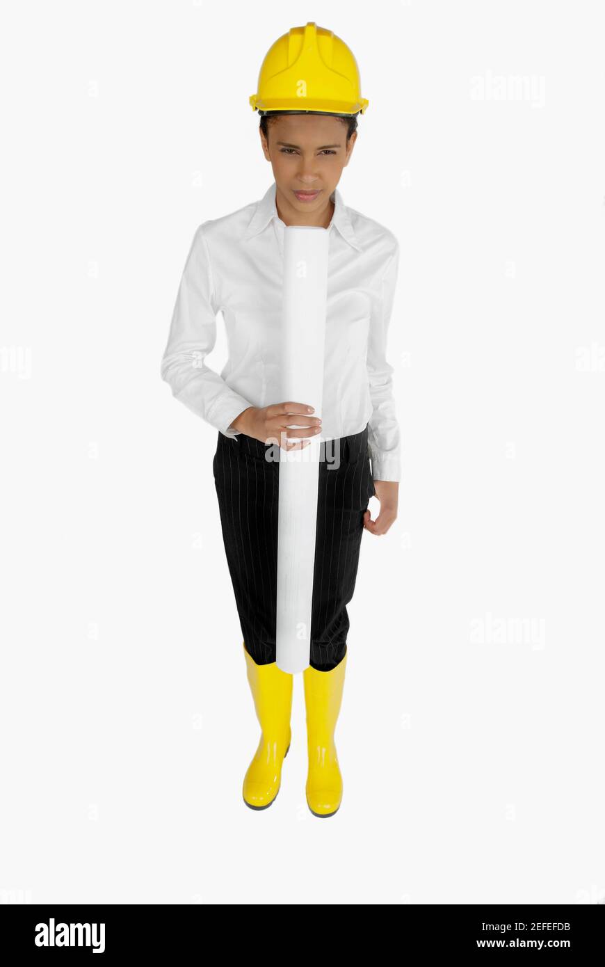 Portrait of a female architect holding a blueprint Stock Photo
