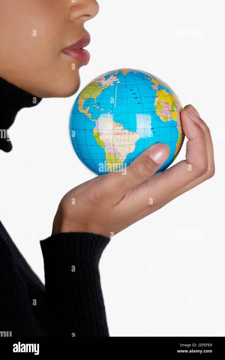 Holding globe hand profile hi-res stock photography and images - Alamy