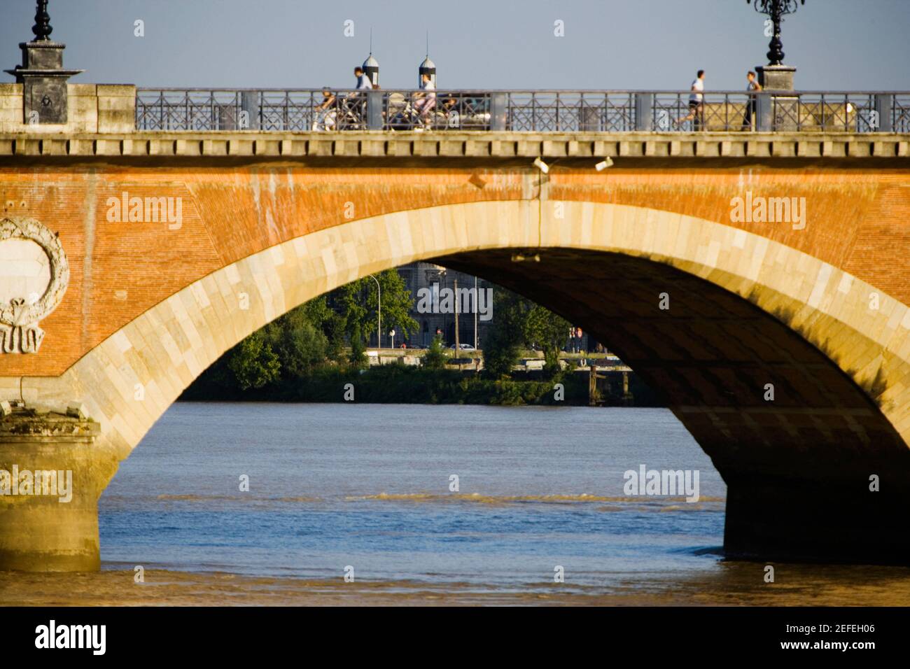 Arch bridge across a river, Pont De Pierre, Garonne River, Bordeaux, Aquitaine, France Stock Photo