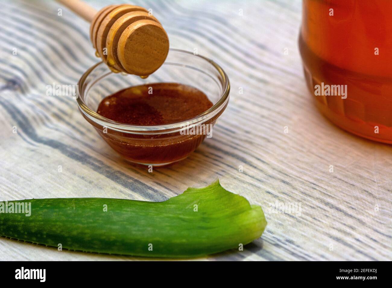 Homemade diy mask for treating dermatitis seborreica with aloe vera, honey  and cinnamon Stock Photo - Alamy