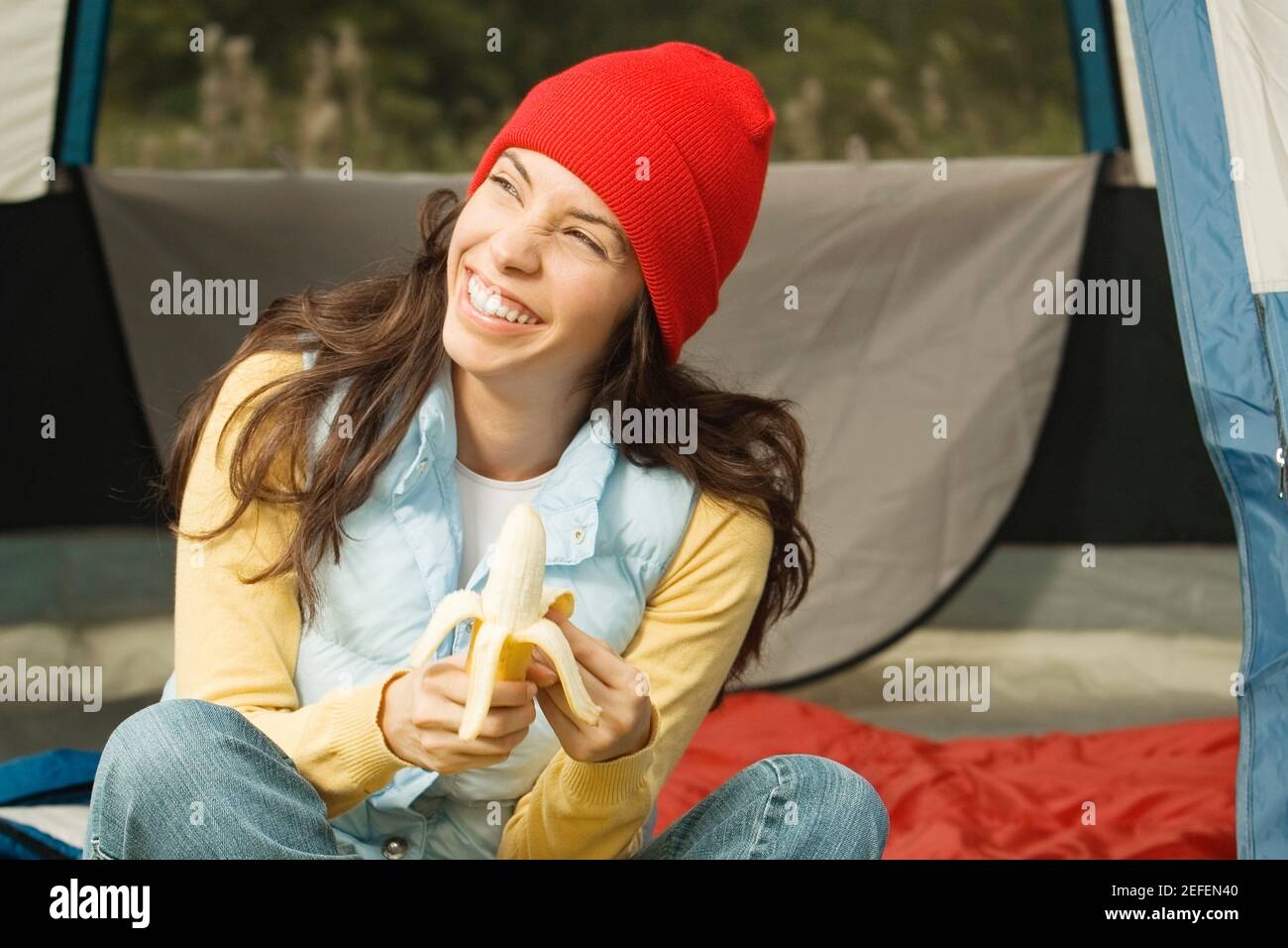 Woman peeling banana hi-res stock photography and images - Alamy