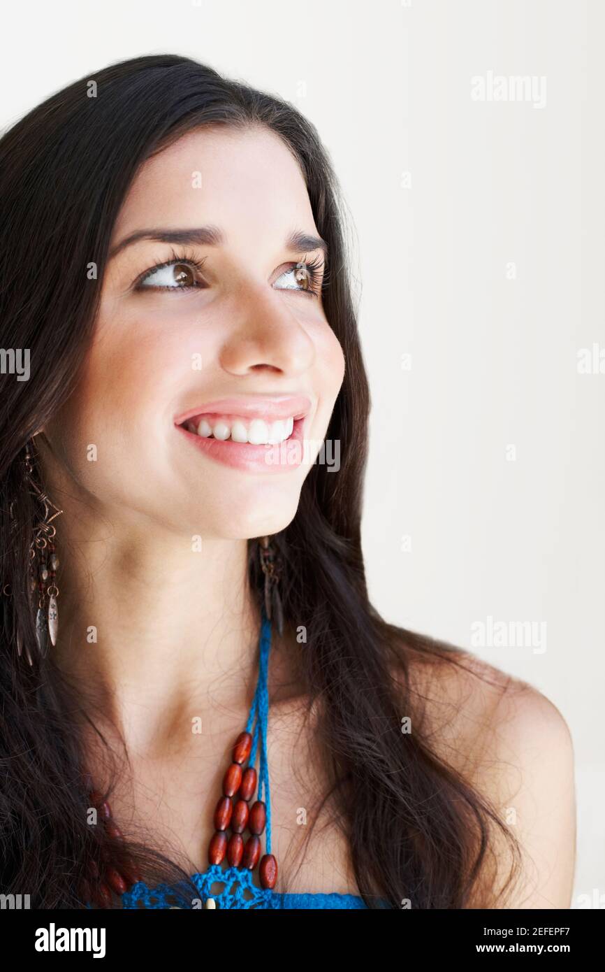 Close-up of a young woman smiling Stock Photo - Alamy