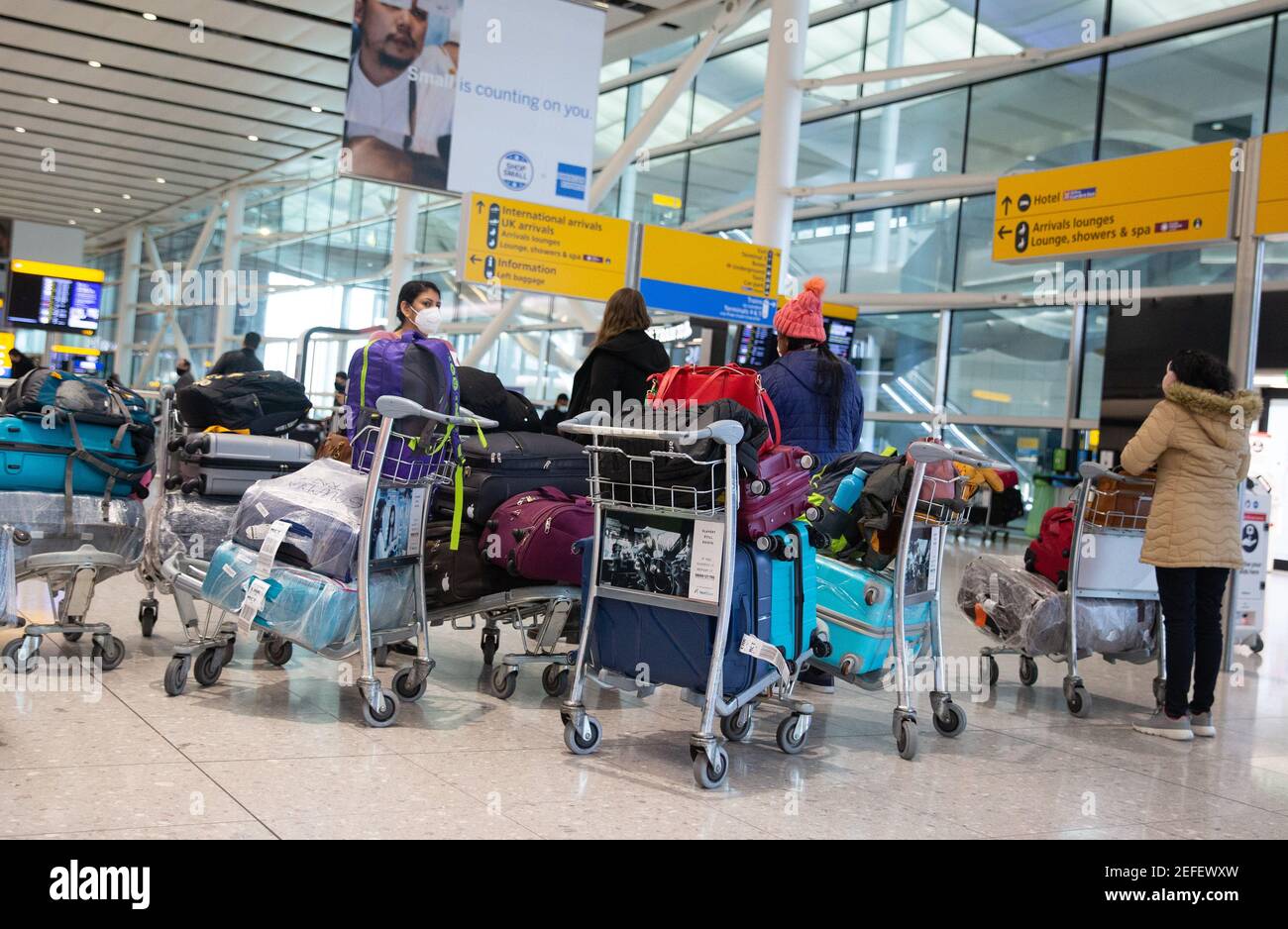 London, UK. 17th Feb, 2021. International passengers arriving at Heathrow Terminal 2. Anyone arriving from 'Red List' countries must quarantine in a hotel at the airport for 10 days at a cost of £1750. Credit: Mark Thomas/Alamy Live News Stock Photo